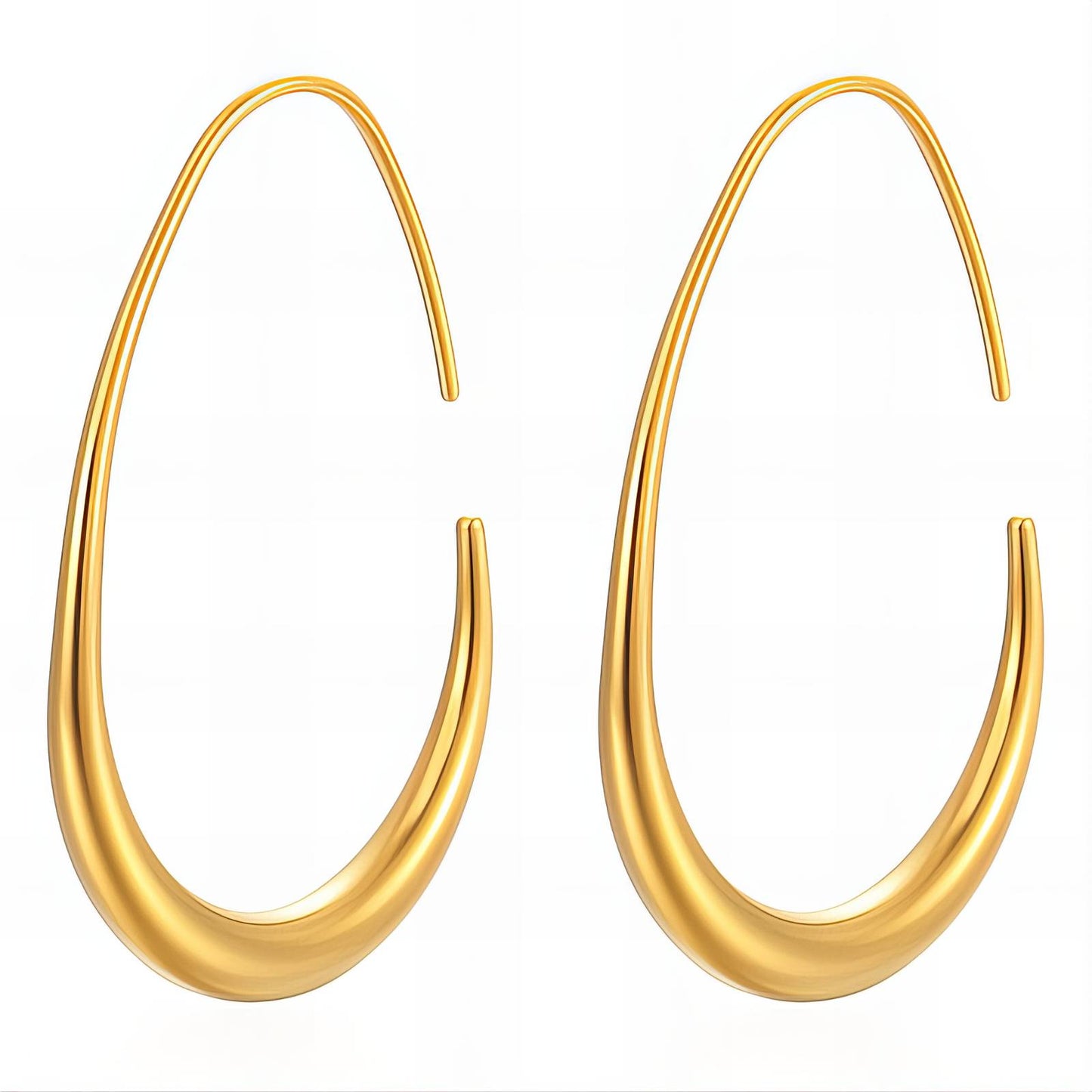 Gold hoop earrings on a white background