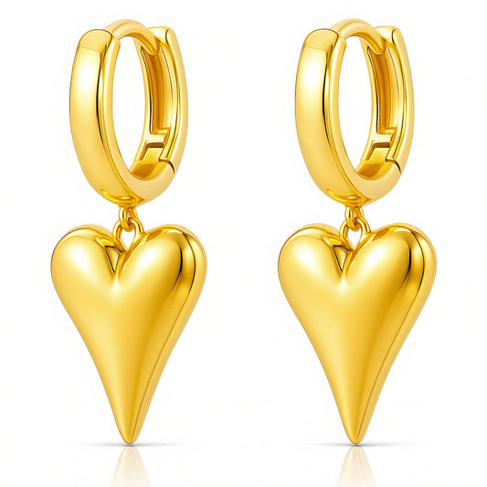 Gold heart-shaped hoop earrings on a white background
