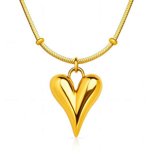 Gold heart-shaped pendant on a gold chain against a white background