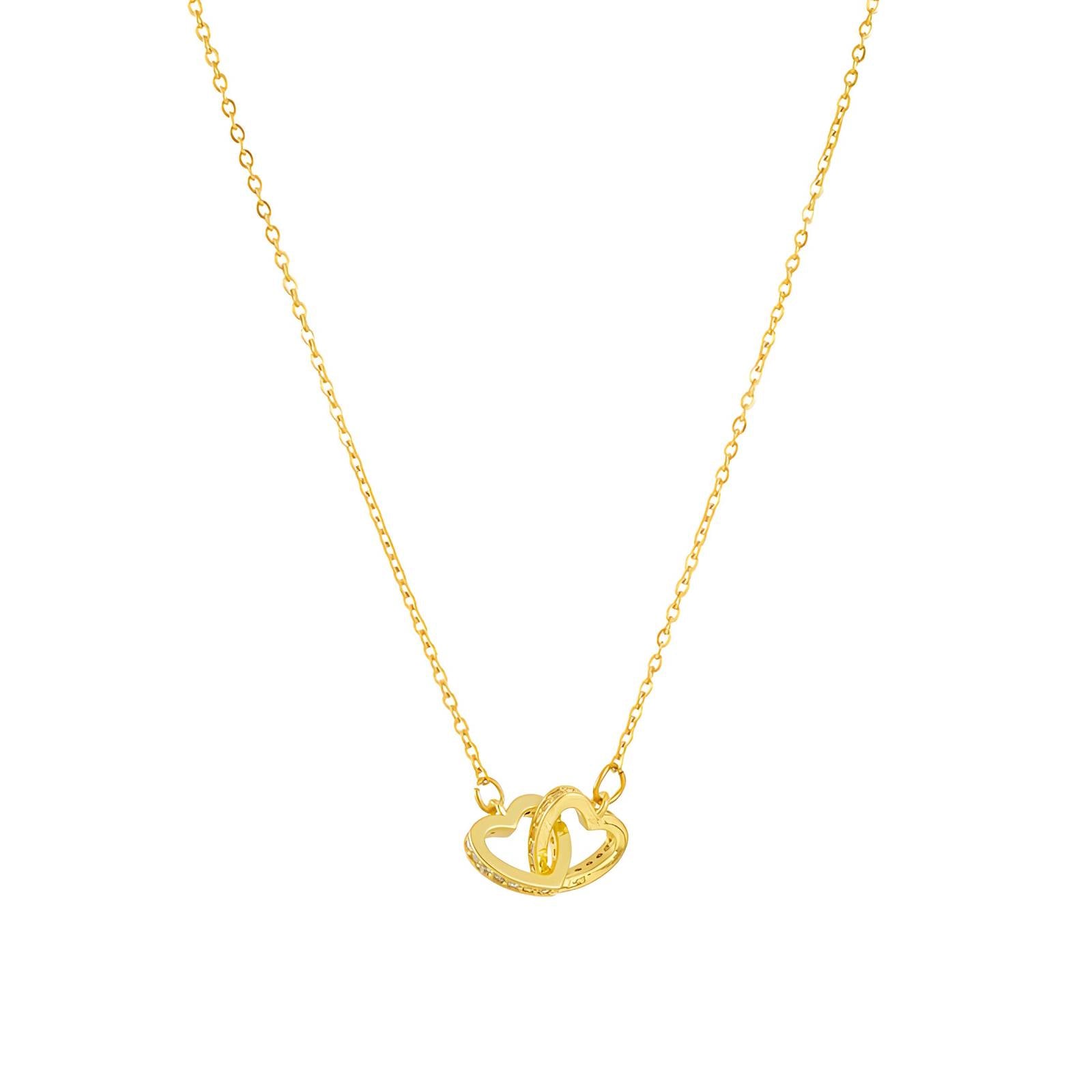 Gold necklace with a heart-shaped pendant on a white background