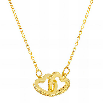 Gold necklace with a heart-shaped pendant on a white background