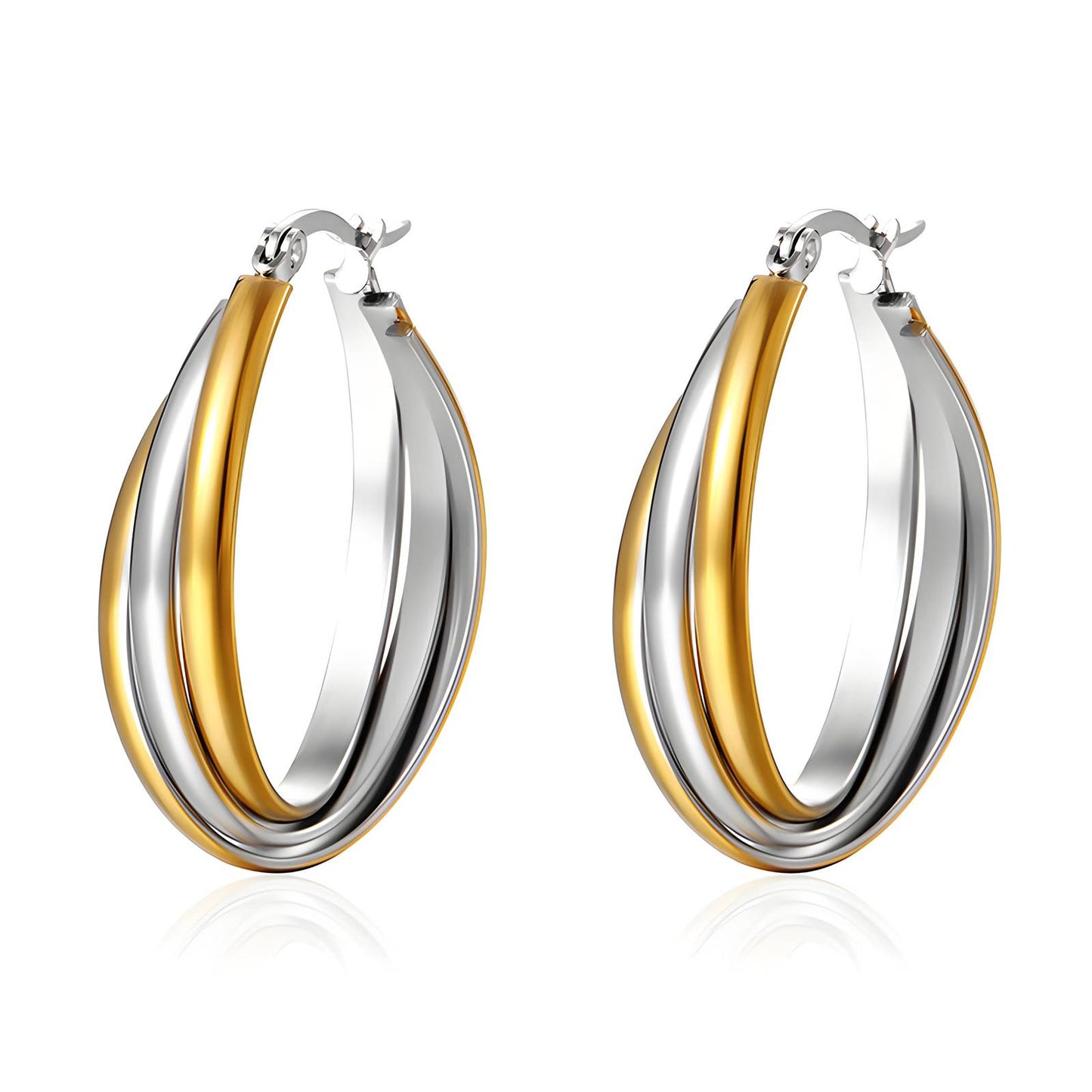 Two-tone gold and silver hoop earrings on a white background