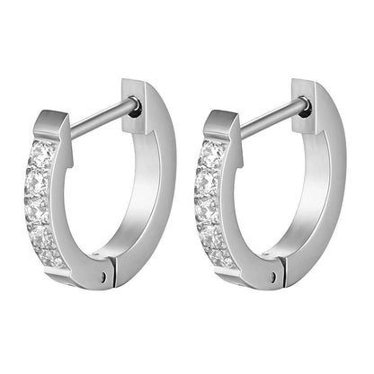 Elegant silver huggie earrings featuring shimmering cubic zirconia stones