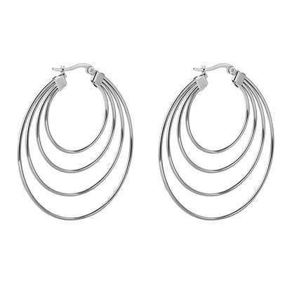 Pair of silver hoop earrings with multiple concentric circles on a white background
