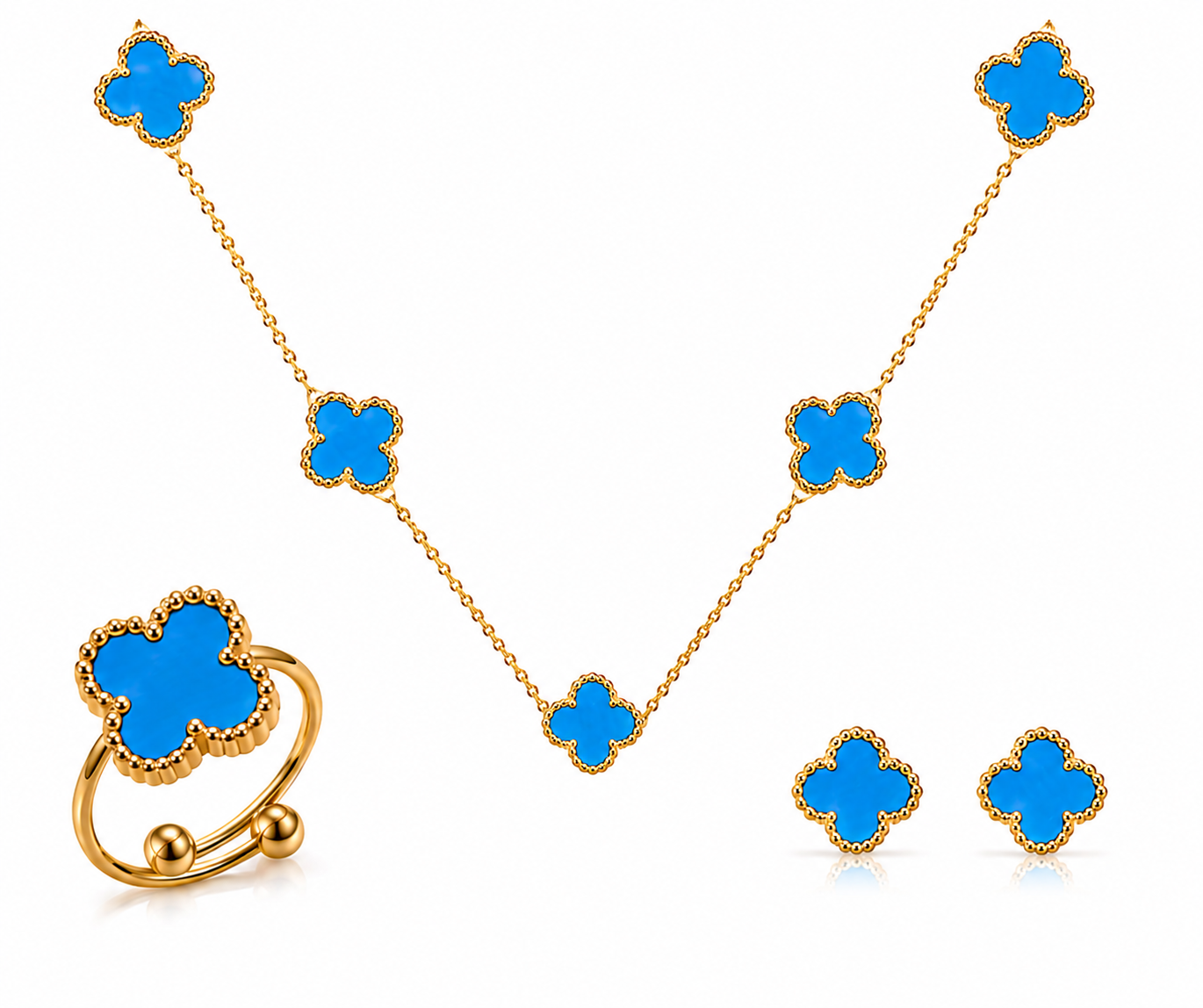 Gold jewelry set with blue clover-shaped stones on a white background